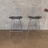 Pair of Herman Miller Eames Wire Stools w/ Black Cushions