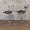 Pair of Herman Miller Eames Wire Stools w/ Black Cushions