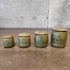 Set of Four Apothecary Jars With Lids