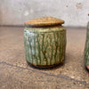 Set of Four Apothecary Jars With Lids
