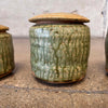 Set of Four Apothecary Jars With Lids