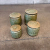 Set of Four Apothecary Jars With Lids