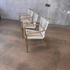 Set of Four White Cord Contemporary Arm Chairs - Aluminum w/ Gold Pipping