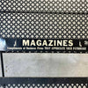 1950s Iron Magazine Rack - Folding Back Leg Product Image