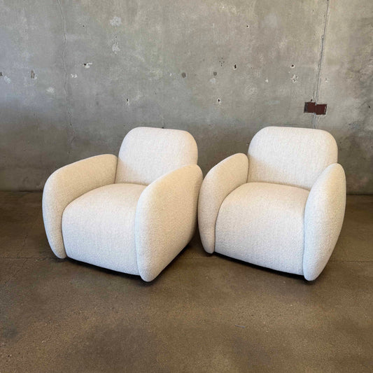Pair of Vereien Modernist Swivel Chairs in Ivory Boucle