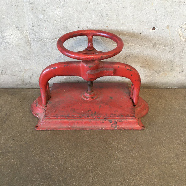 An antique cast iron book press, with brass maker's label to… - Antique &  Art Auction - Cordy's - Antiques Reporter