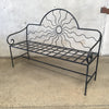 Minimalist Black Wrought Iron Patio Bench With Sun Design