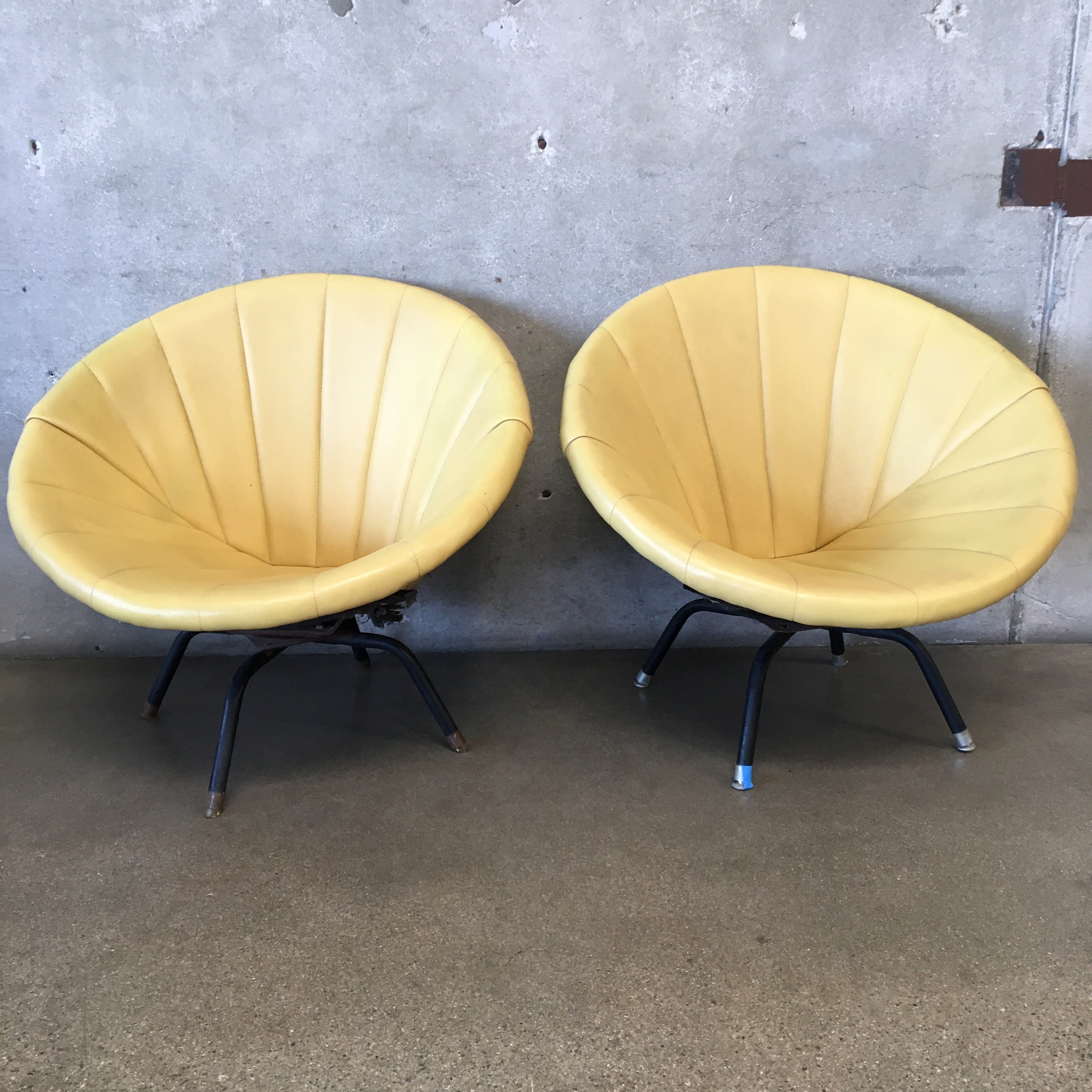 Yellow shop saucer chair