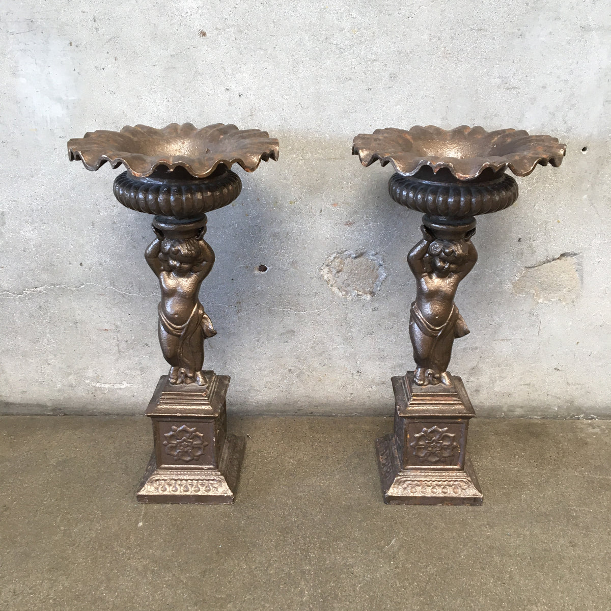 Pair of Vintage Iron Cherub Flower Stands