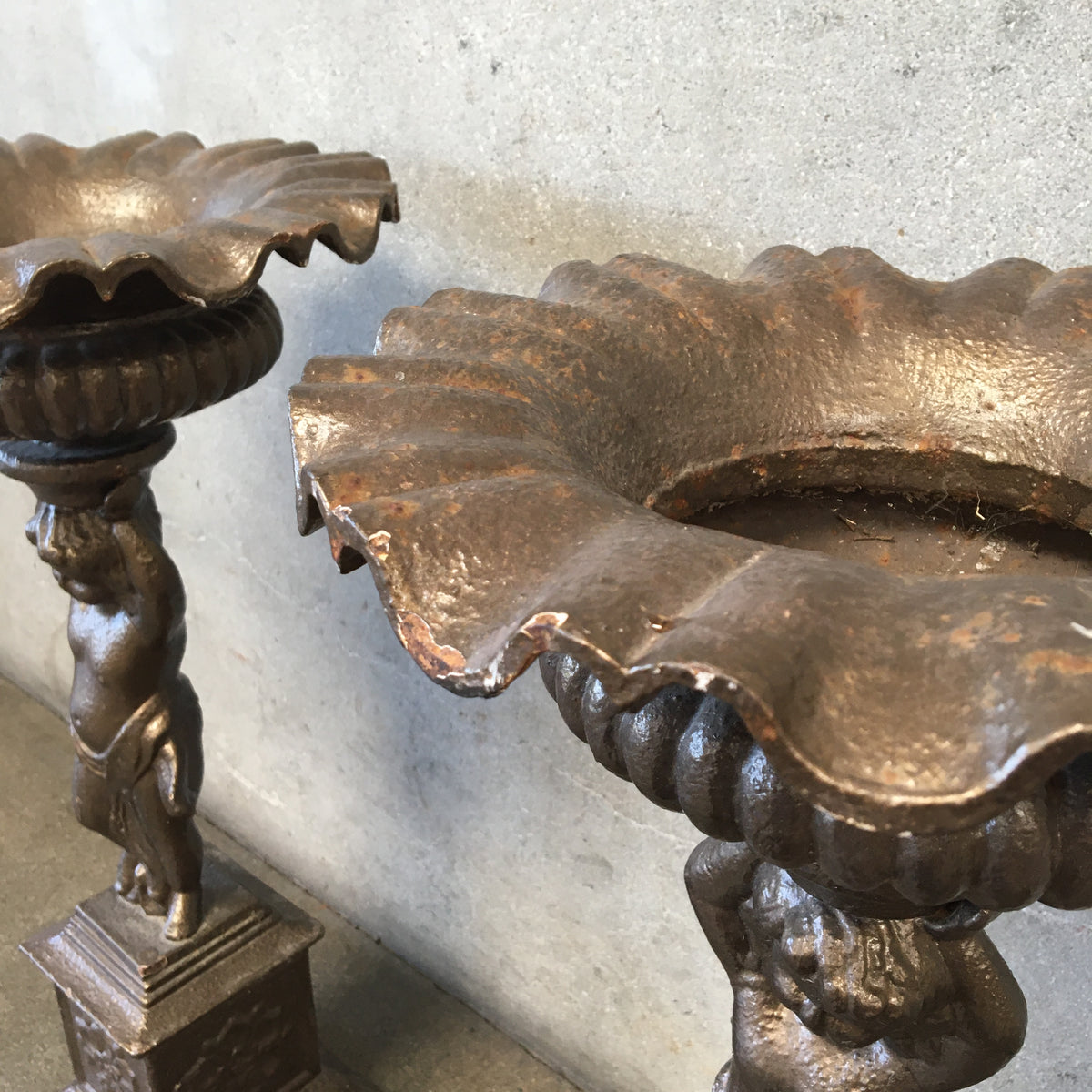 Pair of Vintage Iron Cherub Flower Stands