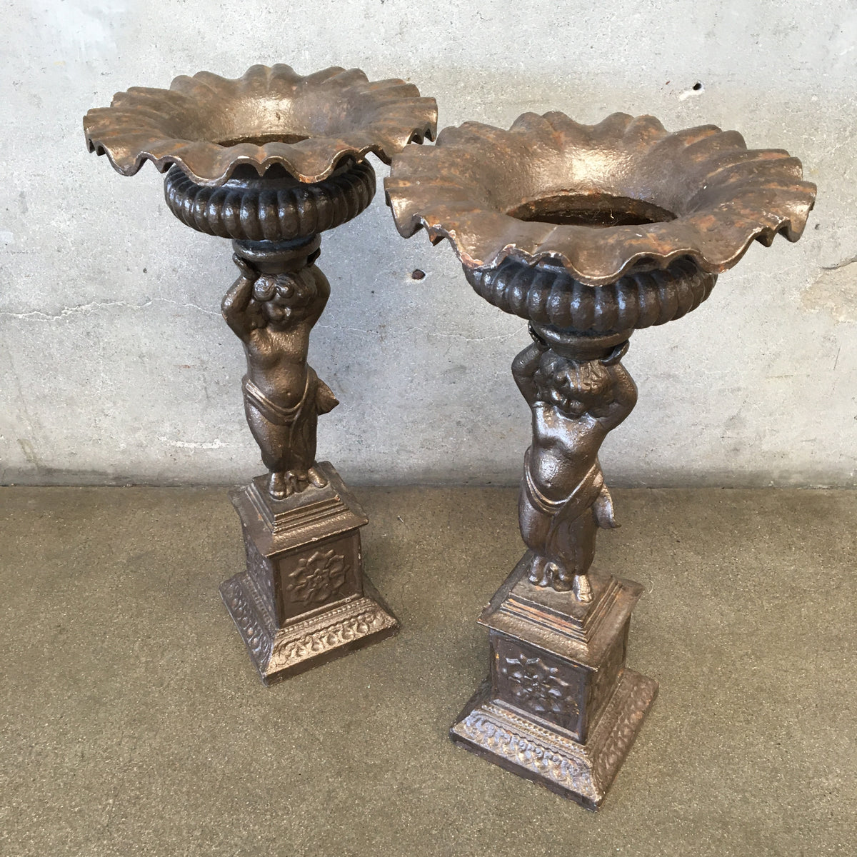 Pair of Vintage Iron Cherub Flower Stands
