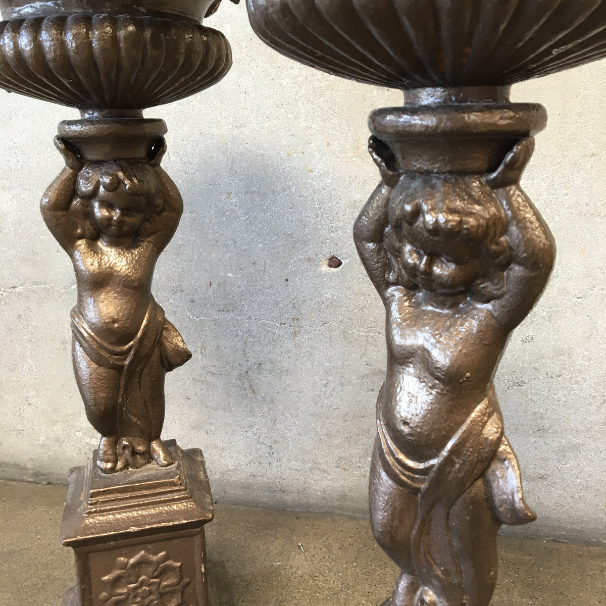 Pair of Vintage Iron Cherub Flower Stands