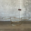 Milo Baughman Style Three Tier Swivel Glass & Gold Tone Metal Tube Coffee Table