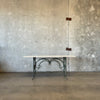 Travertine & Scrolled Metal Console Table