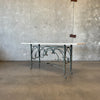 Travertine & Scrolled Metal Console Table