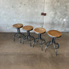 Set of Four Adjustable Industrial Barstools