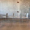 Set of Four "Chairik" Stacking Danish Chairs By Erik Magnussen