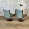 Pair of Mid Century Walnut Swivel Chairs with Vinyl Upholstery - As Is