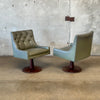 Pair of Mid Century Walnut Swivel Chairs with Vinyl Upholstery - As Is