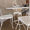 1970s Flower Detail Five Piece Iron Patio Table With Four Chairs