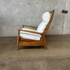 Mid Century Lounge Chair With Leather Upholstery