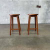Pair of Studio Craft Solid Walnut Stools