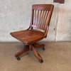 Antique Oak Bankers Chair On Castors