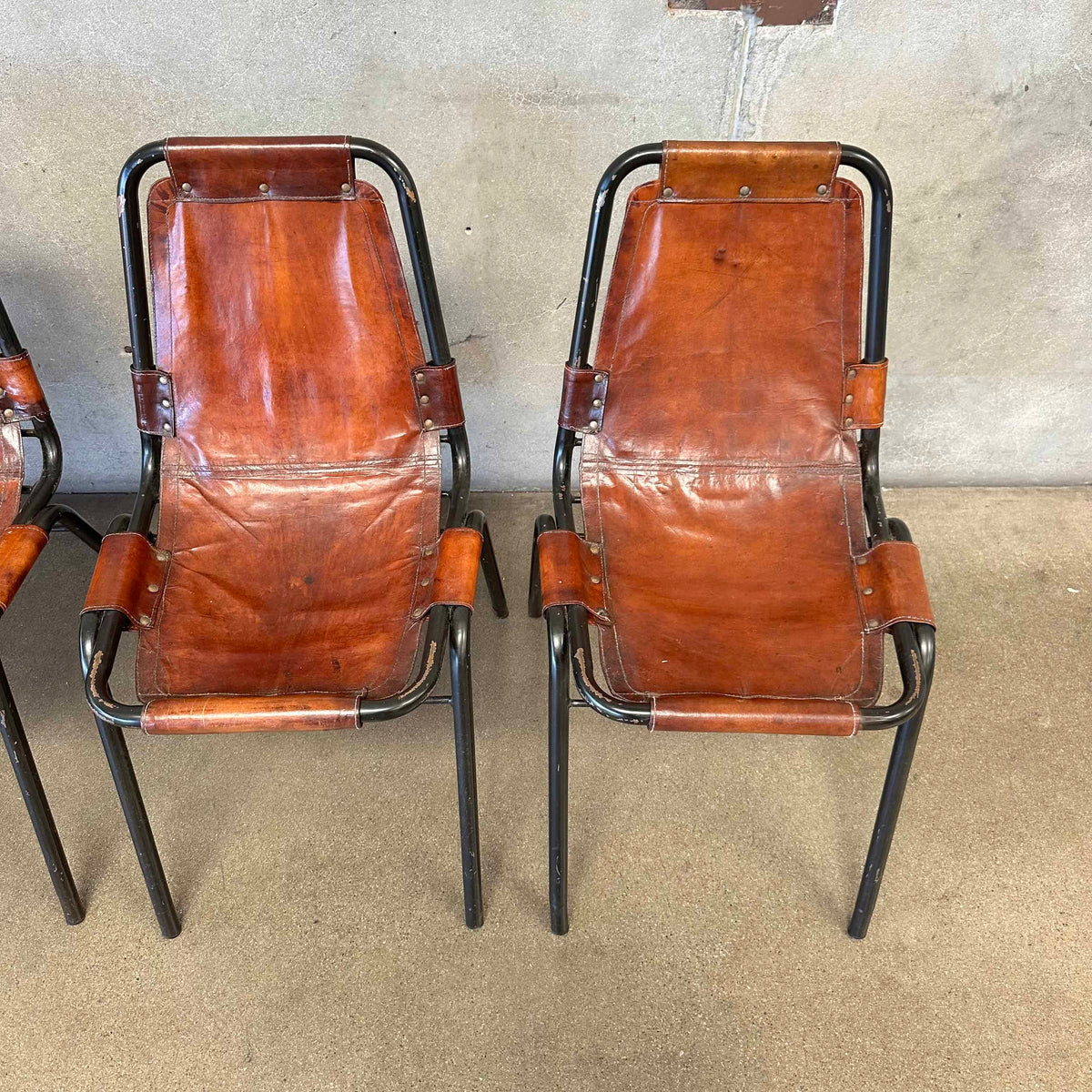 Set of Four Charlotte Perriand Chairs For Les Acres In Steel & Leather