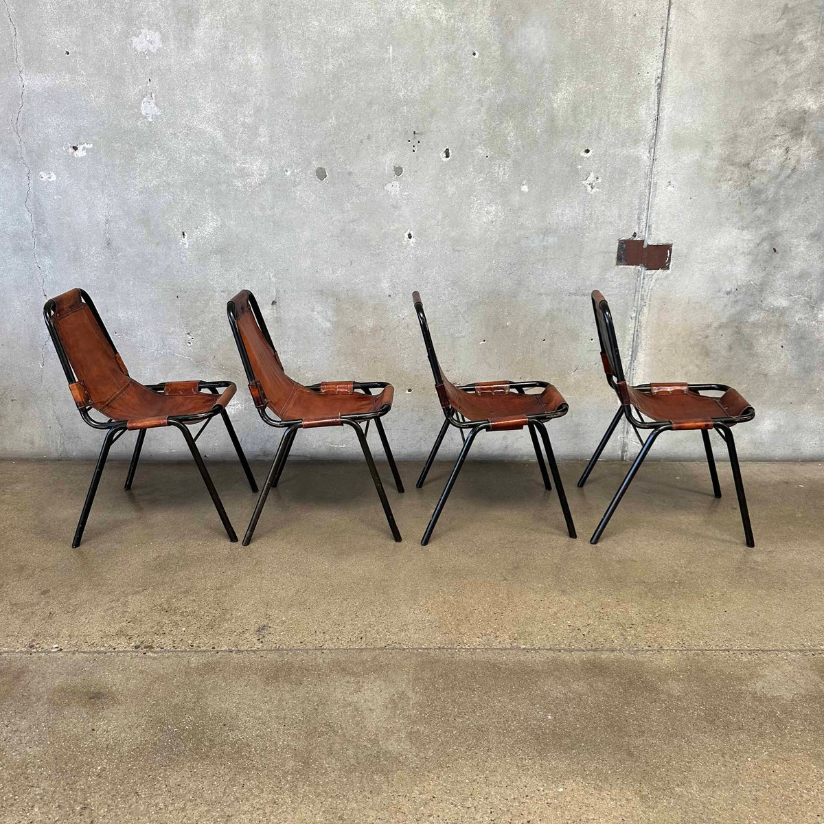 Set of Four Charlotte Perriand Chairs For Les Acres In Steel & Leather
