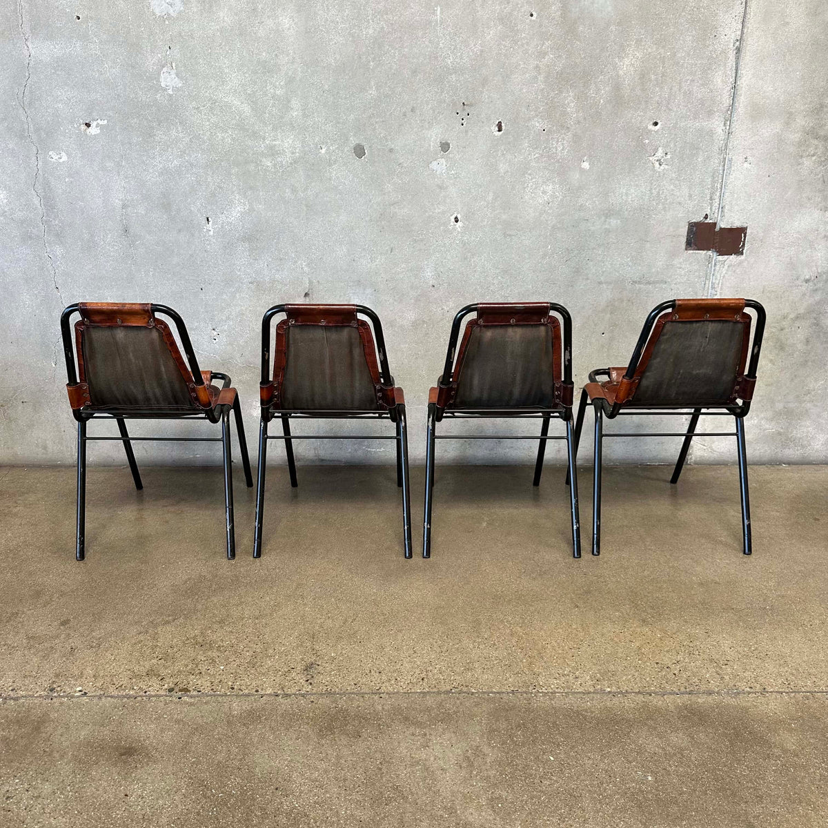 Set of Four Charlotte Perriand Chairs For Les Acres In Steel & Leather