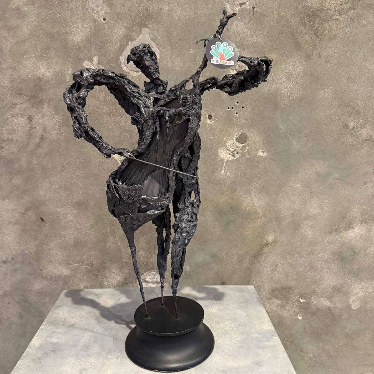 Brutalist Cello Player Sculpture