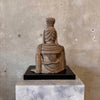 Carved Buddha on Black Pedestal