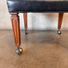 Mid Century Ottoman On Casters