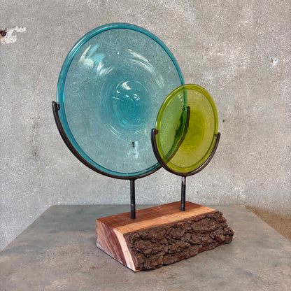 Blown Glass Disc Sculpture on Redwood
