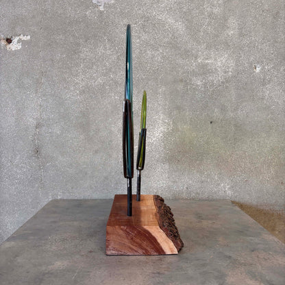 Blown Glass Disc Sculpture on Redwood