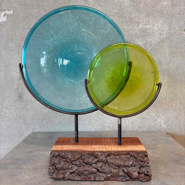 Blown Glass Disc Sculpture on Redwood
