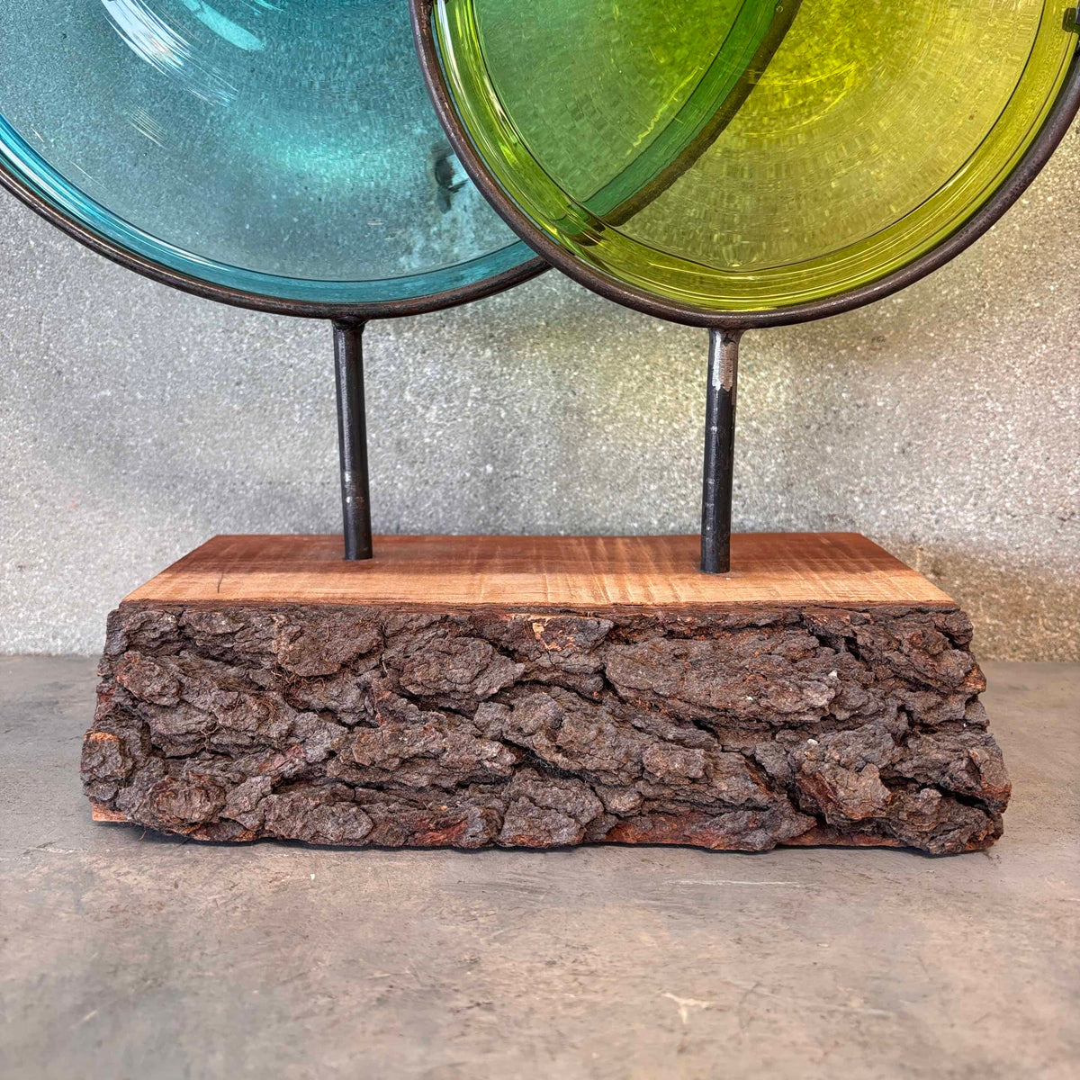 Blown Glass Disc Sculpture on Redwood