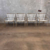 Set of Four White Cord Contemporary Arm Chairs - Aluminum w/ Gold Pipping