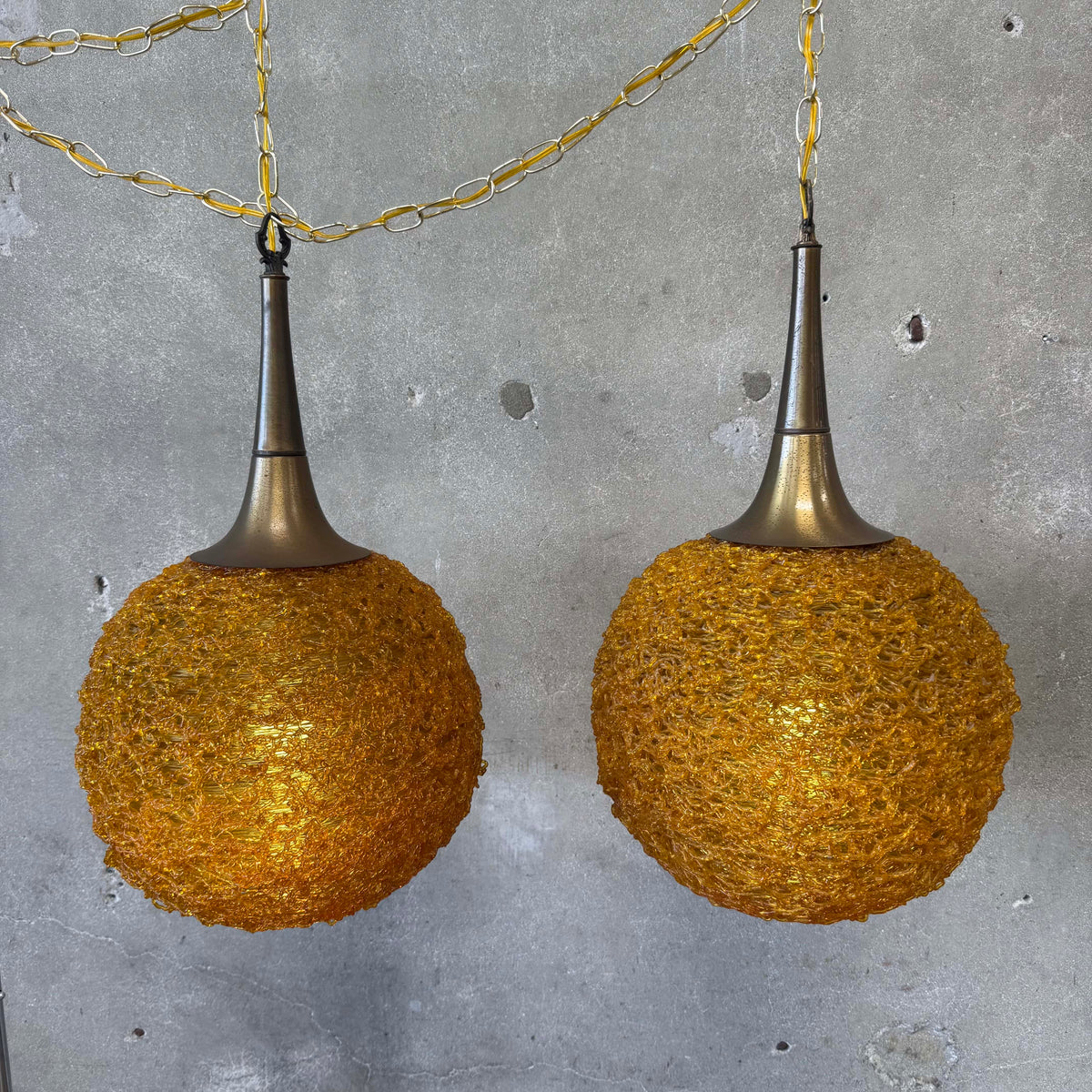 Rare Pair of 60's Amber spaghetti Swag Lamps With Trumpet Tops