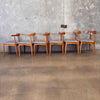 Set of Six Teak Elbow Chairs