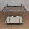 Vintage 1970's Chrome Mirrored Bar Cart With Smoked Glass