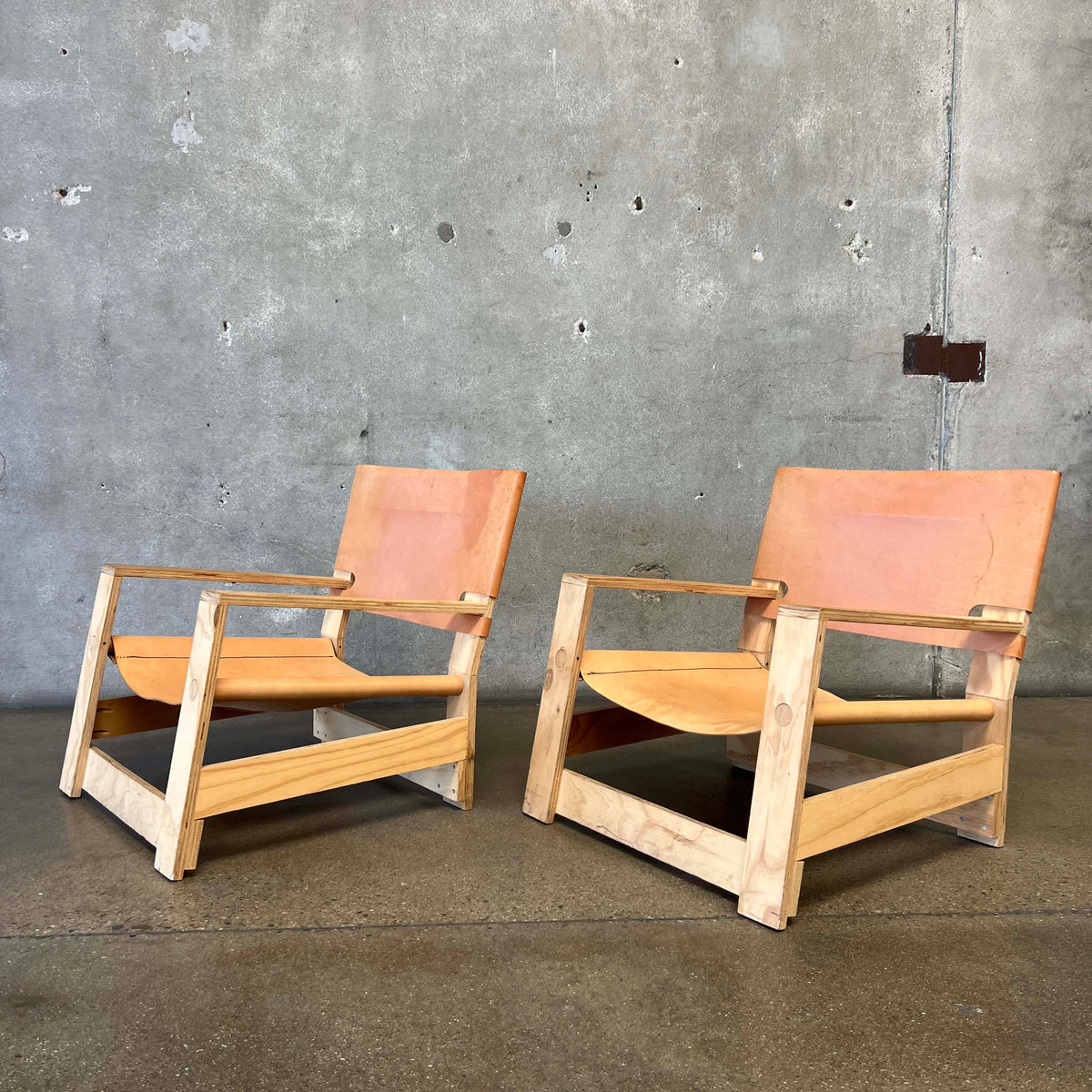 Pair Leather & Plywood Architectural Lounge Chairs