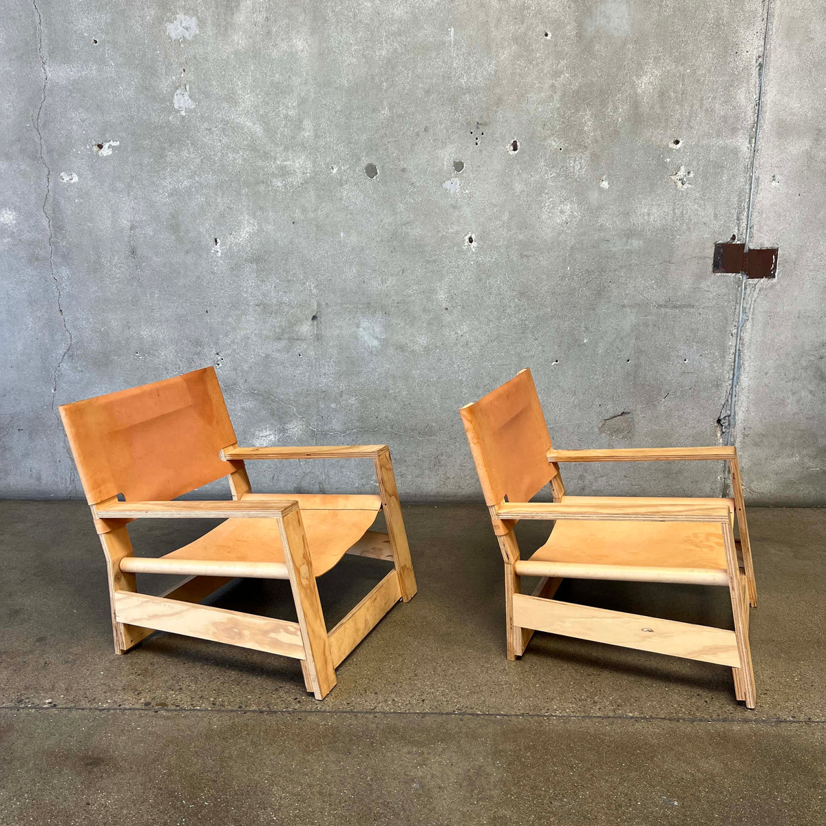 Pair Leather & Plywood Architectural Lounge Chairs