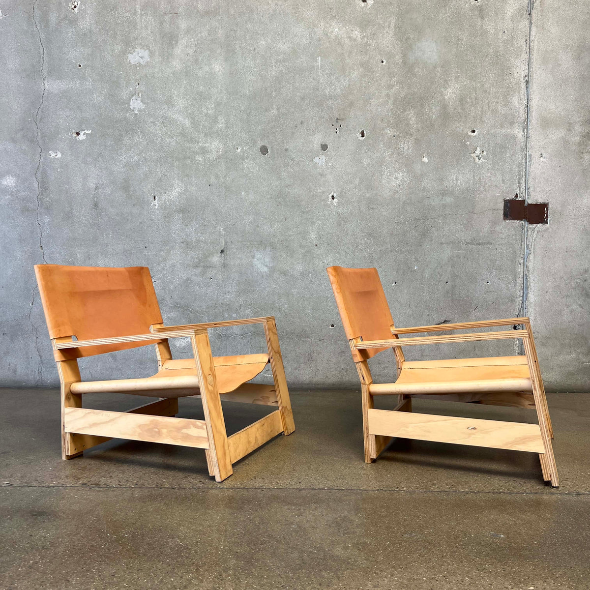 Pair Leather & Plywood Architectural Lounge Chairs