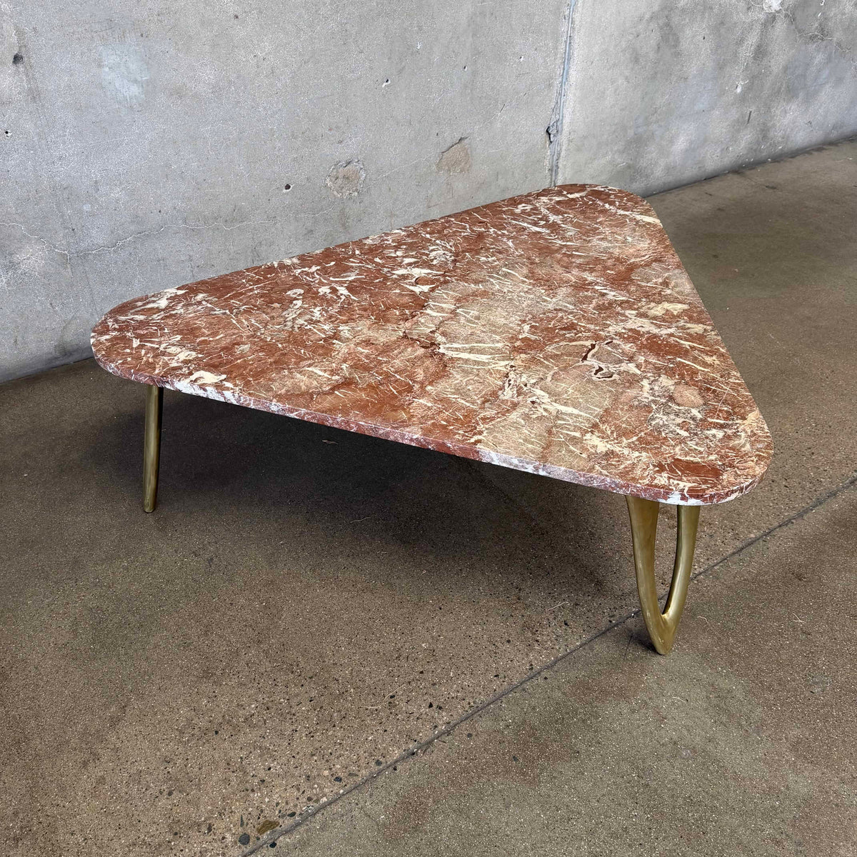 Mid Century Triangular Coffee Table With Red Marble & Brass Legs