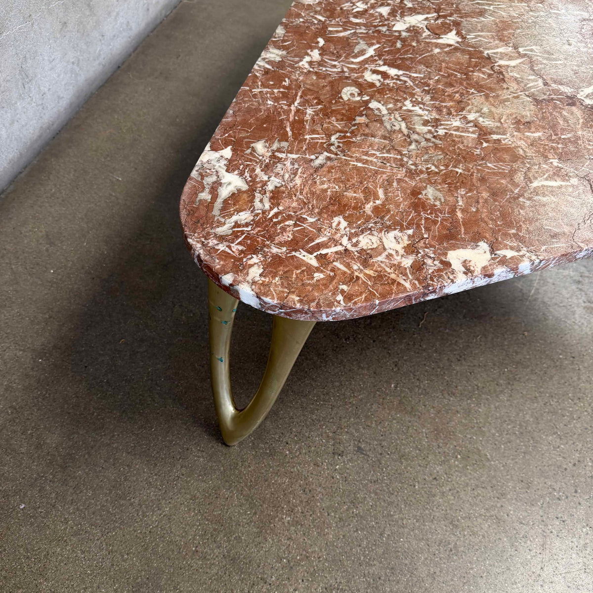 Mid Century Triangular Coffee Table With Red Marble & Brass Legs