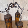 Mid Century Spanish Revival/Gothic Four-Arm Iron & Amber Glass Plug-In Chandelier
