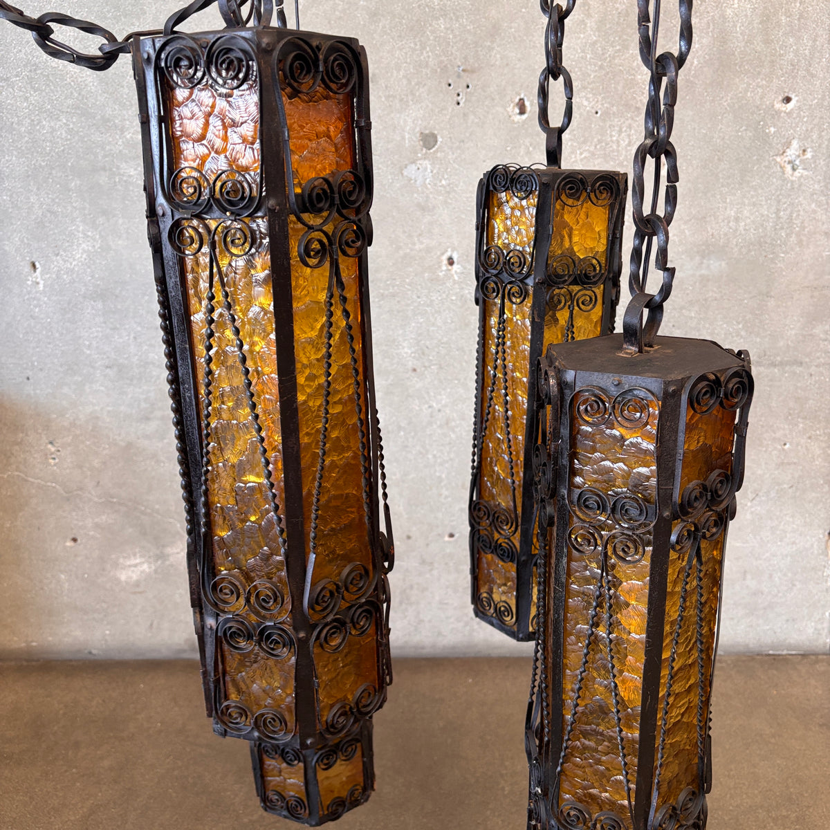 Mid Century Spanish Revival/Gothic Four-Arm Iron & Amber Glass Plug-In Chandelier