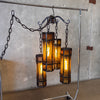 Mid Century Spanish Revival/Gothic Four-Arm Iron & Amber Glass Plug-In Chandelier