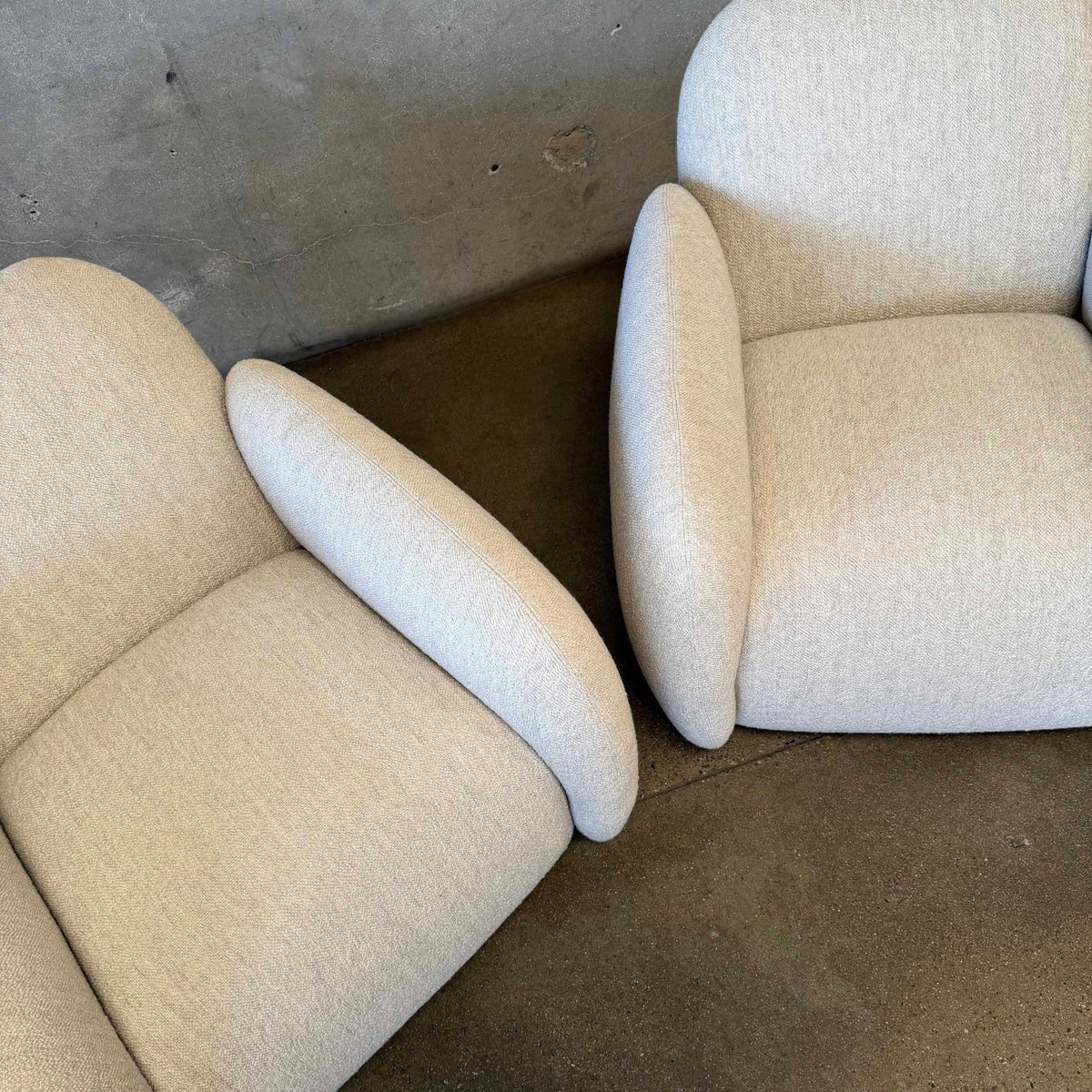 Pair of Vereien Modernist Swivel Chairs in Ivory Boucle